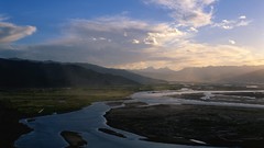 Landscapes sunset nature grass sun Mountains clouds fields 