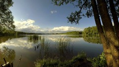 Landscapes sunset nature grass sun Mountains clouds lakes 