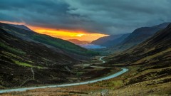 Landscapes sunset nature grass yellow blue clouds red hills 