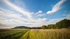 Landscapes sunset nature Trees grass sun Mountains clouds 
