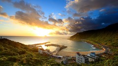 Landscapes sunset Sea nature yellow blue clouds hills white 