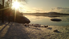 Landscapes sunset snow winter water hills cold Beaches