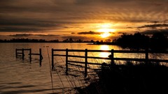 Landscapes sunset water clouds lakes fences skylines