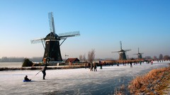 Landscapes windmills frozen river