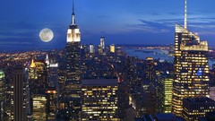 Landscapes yellow blue clouds white bay Skyscrapers buildings 