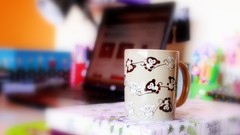 Laptops mugs cups depth of field