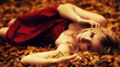 Leaves woman dress lying down fallen leaves