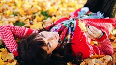 Leaves woman lying down