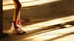 Legs woman Converse sunlight