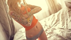 Light woman tattoos models panties