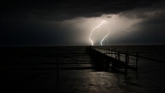 Lightning Sea sky night storm pier clouds horizon outdoors dark