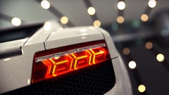 Lights cars close-up Lamborghini races taillights