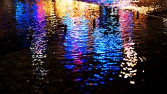 Lights wet pavement reflections bokeh streets