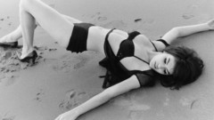 Lingerie woman sand lying