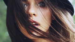 Long hair blue eyes brunettes winds hair in face