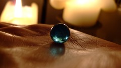 Macro Candles hands reflections spheres