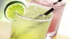 Macro cocktail limes beverages ice cubes