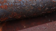 Macro gray orange metal close-up rust spider webs