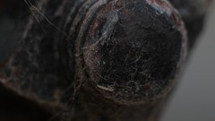 Macro gray orange metal close-up rust spider webs