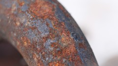 Macro gray orange metal close-up rust spider webs