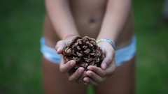 Macro hands pinecones panties