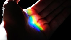 Macro light hands rainbows