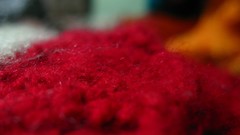 Macro red white orange string threads Woolen
