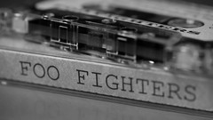 Macro text Music bokeh foo fighters cassette grayscale