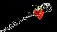 Macro water black strawberries