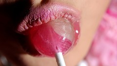 Macro woman lips Candies lollipops