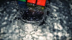 Macro yellow water blue red Green water drops multicolor rubiks 