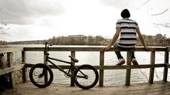 Men back sitting wharf Bicycles rivers bmx