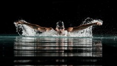 Men black background swimmer wet