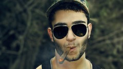 Men cap sunglasses cigars pretentious