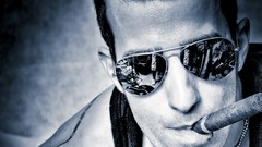 Men close-up faces sunglasses cigars