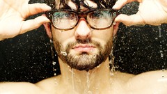 Men close-up glasses faces water drops men with glasses