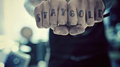 Men fingers tattoos blurred background