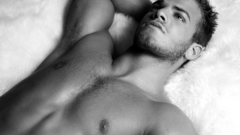 Men topless grayscale lying