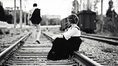 Men woman grayscale trains