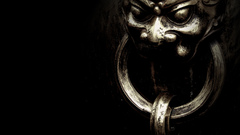 Metallic handle doors knocker