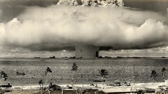 military Nuclear atomic bomb Bikini Atoll mushroom clouds sepia