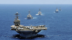 Military ships aircraft carriers.