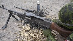 Military soldiers machine gun