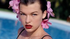 Milla Jovovich flower in hair swimming pools