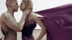 Models couple dirty mud