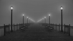 monochrome pier lantern bench mist