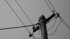 Monochrome power lines electricity pole