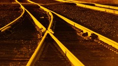 Monochrome sunlight multicolor railroad tracks