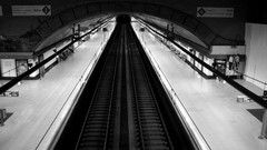 Monochrome trains train stations