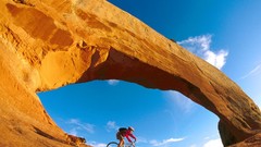 Mountains clouds arch Utah Bicycles Wilson Moab motorbikes